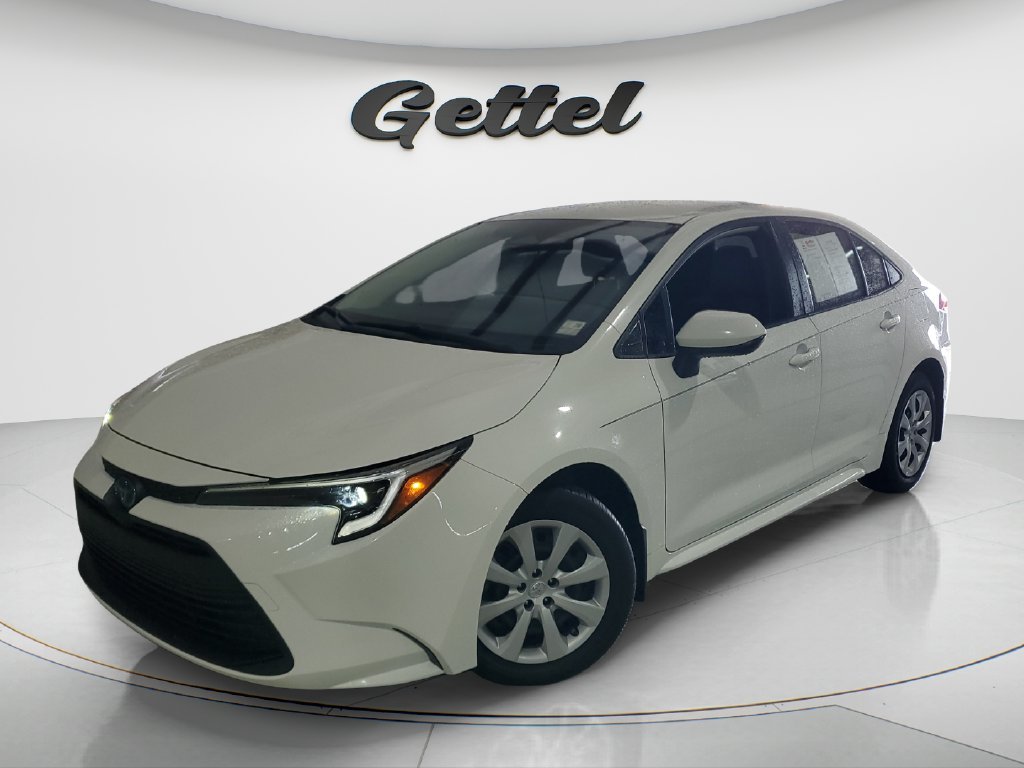 Used 2023 White Toyota LE image 1