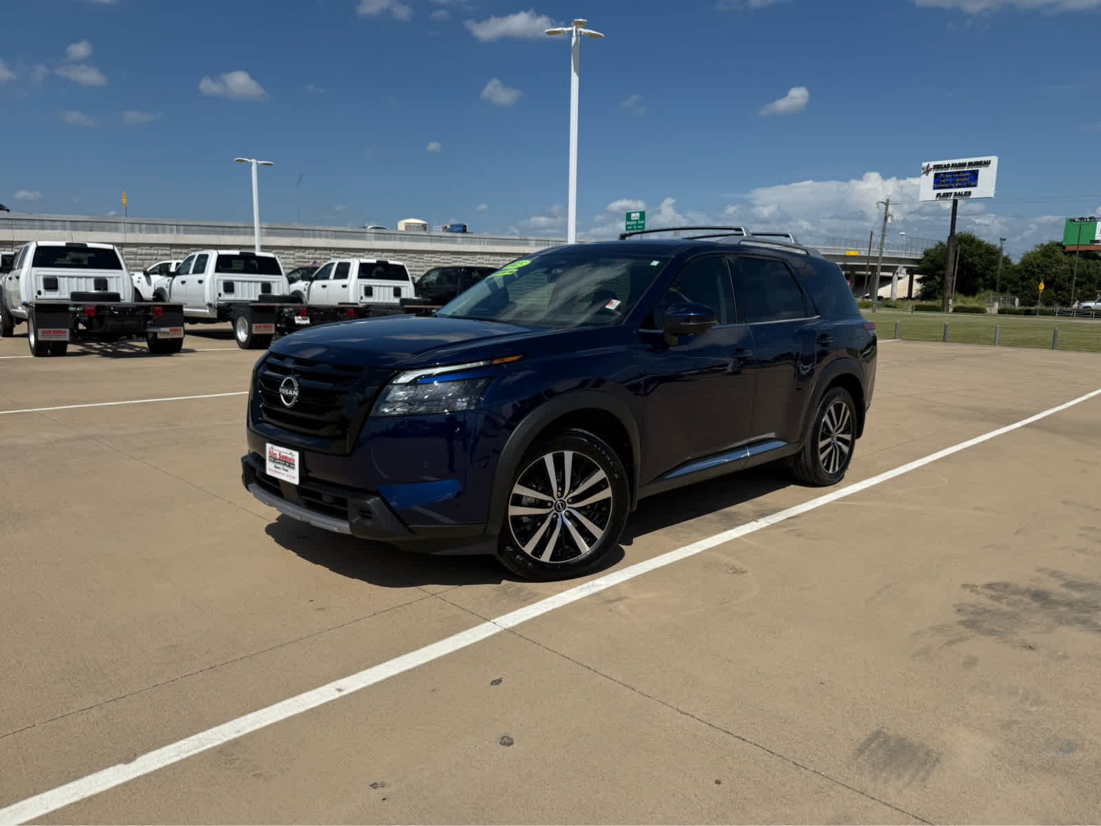 Used 2025 Deep Ocean Blue Pearl Nissan Platinum image 4