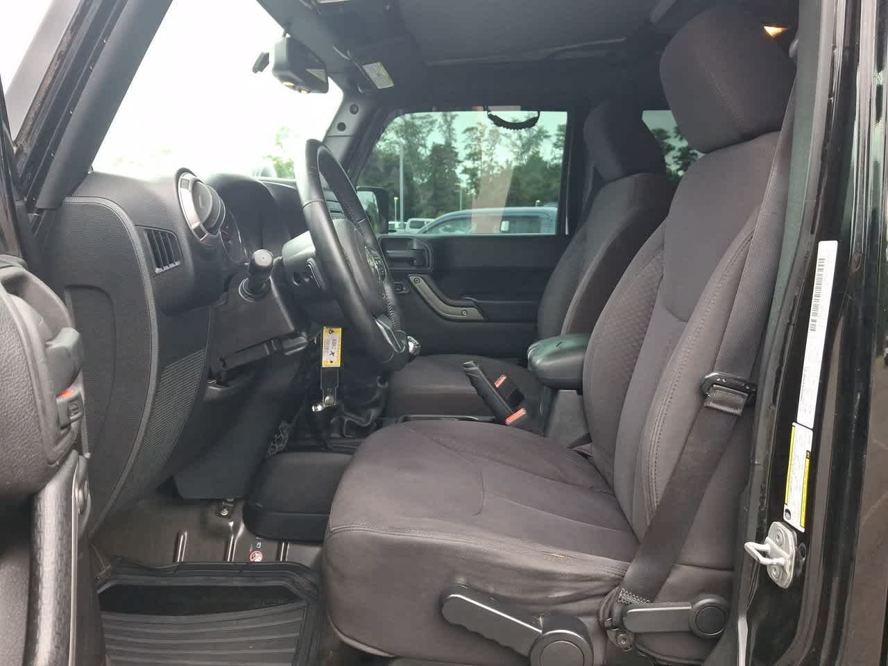 Used 2013 Black Clearcoat Jeep Sport image 17