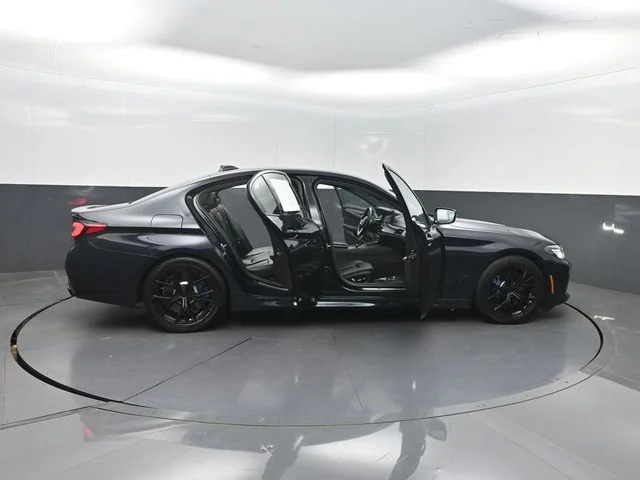 Used 2021 Black BMW M550i xDrive image 36