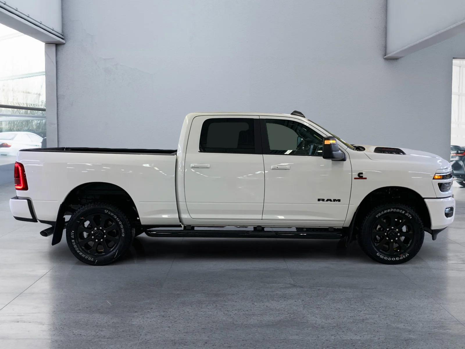 New 2026 Bright White Ram Laramie image 6