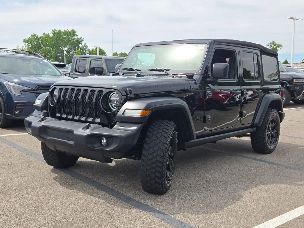 Used 2020 Black Jeep Unlimited Sport image 6