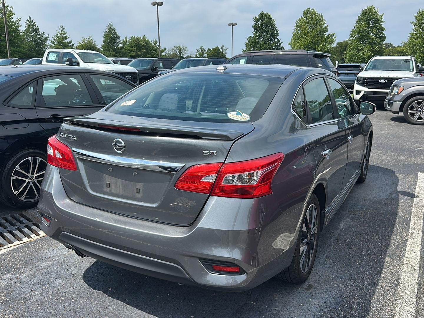 Used 2019 Gun Metallic Nissan SR image 3