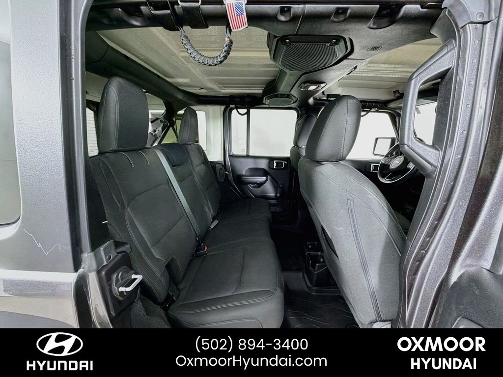 Used 2018 Granite Crystal Metallic Clearcoat Jeep Sport image 25