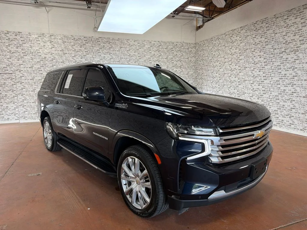 Used 2023 Midnight Blue Metallic Chevrolet High Country image 1