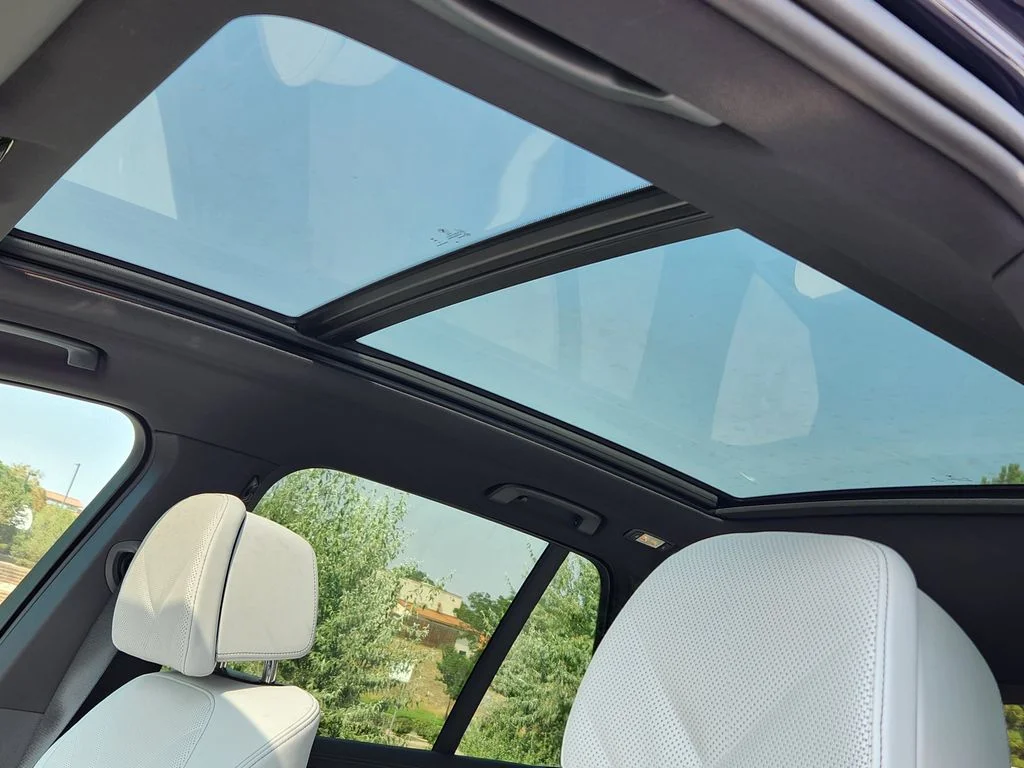 New 2026 Tanzanite Blue II Metallic BMW xDrive50e image 18