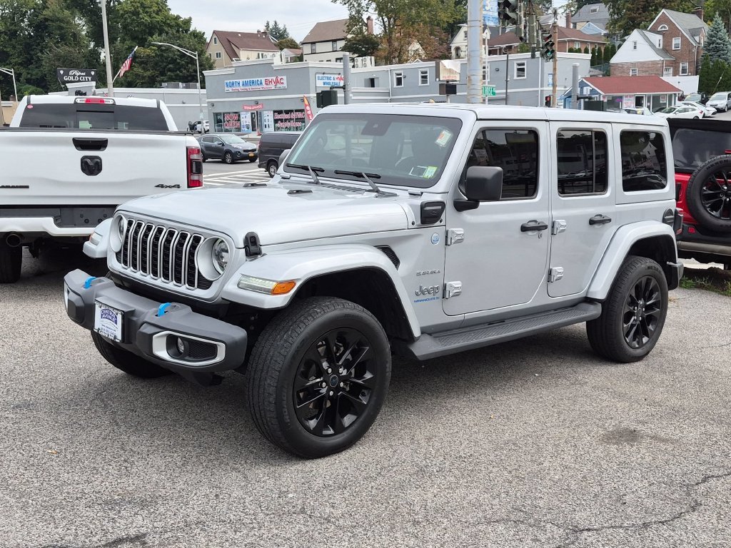 Used 2024 Silver Jeep Sahara 4xe image 1