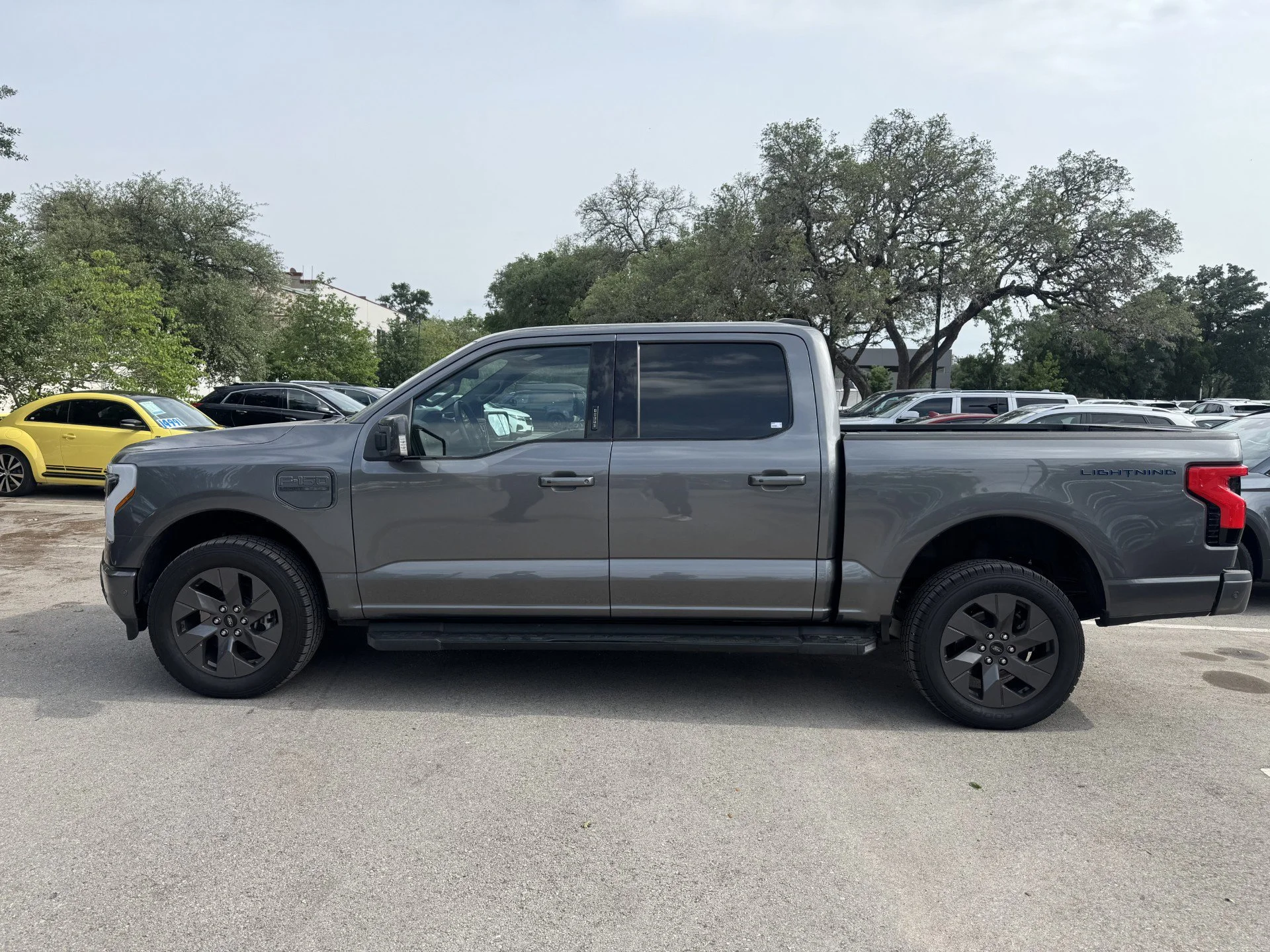 Used 2022 Ford F-150 Lightning Lariat with VIN 1FTVW1EL2NWG05493 for sale in San Antonio, TX
