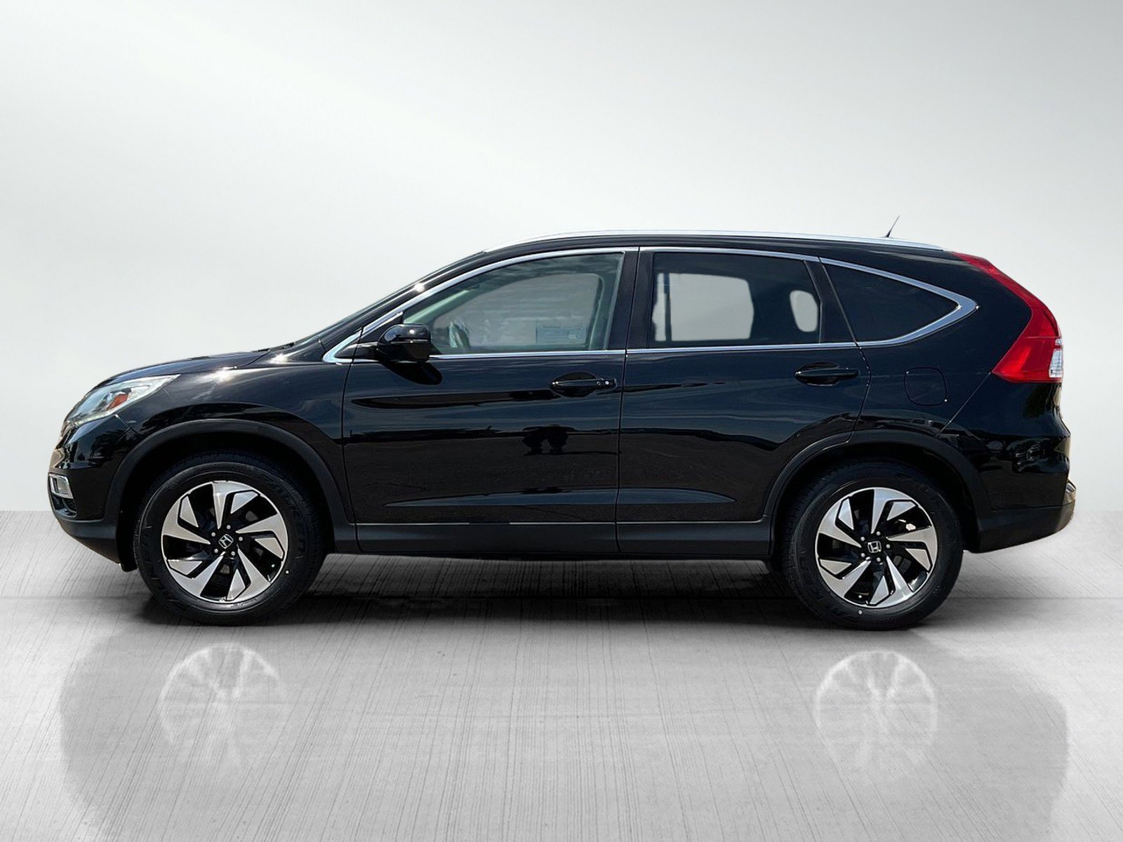 Used 2016 Honda CR-V Touring with VIN 5J6RM4H94GL021636 for sale in Brainerd, MN