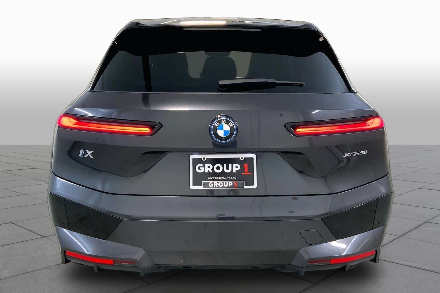 Certified Used 2024 Dark Graphite Metallic BMW xDrive50 image 4
