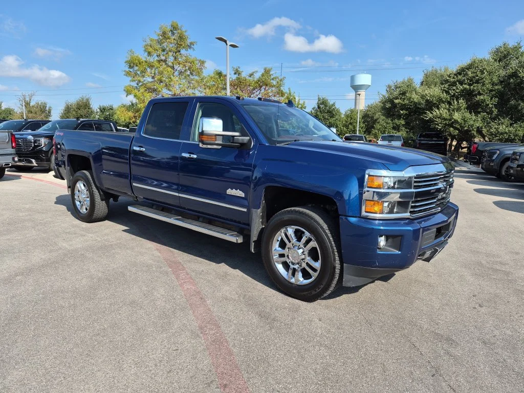 Used 2016 DEEP OCEAN BLUE METALLIC Chevrolet High Country image 1