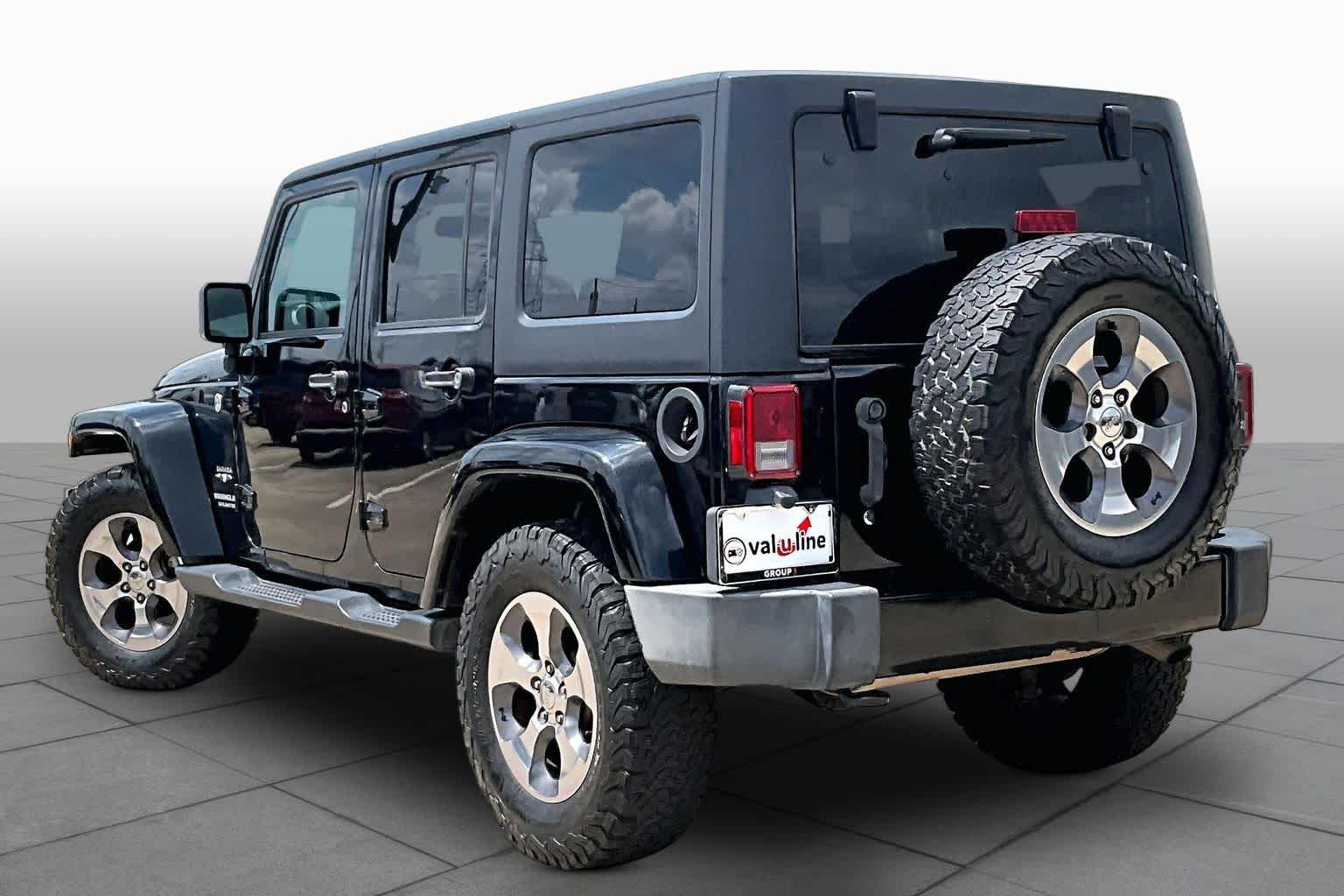 Used 2017 Black Clearcoat Jeep Sahara image 11