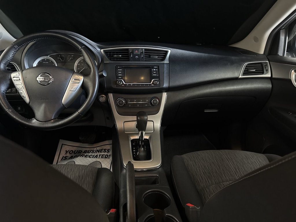 Used 2015 Gun Metallic Nissan SV image 18