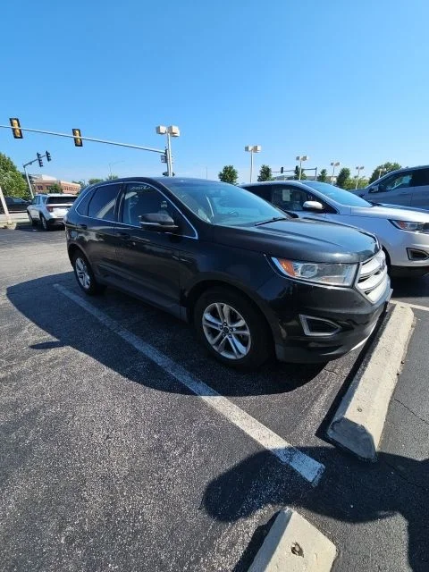 Used 2015 Tuxedo Black Metallic Ford SEL image 1