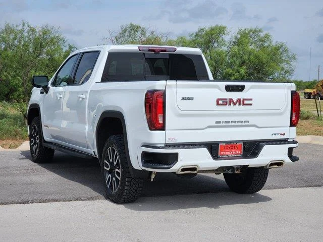 Used 2024 Summit White GMC AT4 4x4 Crew Cab 5.75 ft. box 147.4 in. WB image 4