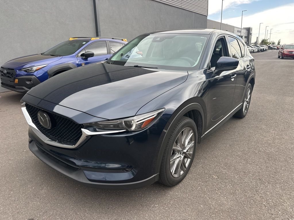 Used 2021 Blue Mazda Grand Touring image 1