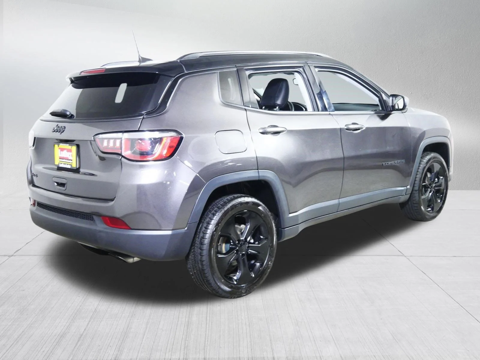 Used 2019 Granite Crystal Metallic Clearcoat Jeep Altitude image 7