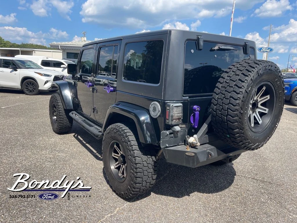 Used 2013 Black Clearcoat Jeep Unlimited Sport image 12