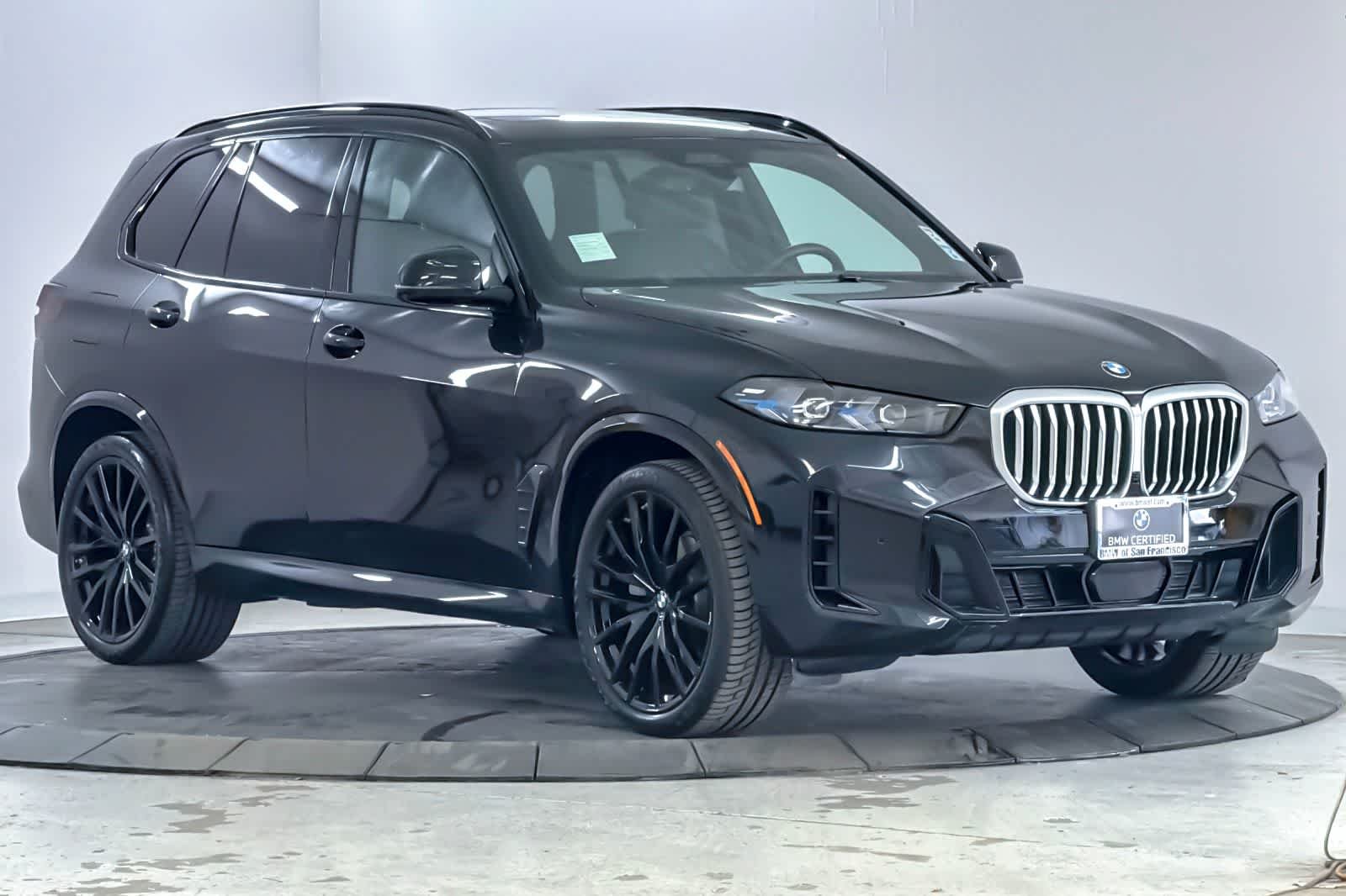 Certified Used 2024 Black Sapphire Metallic BMW xDrive40i image 9