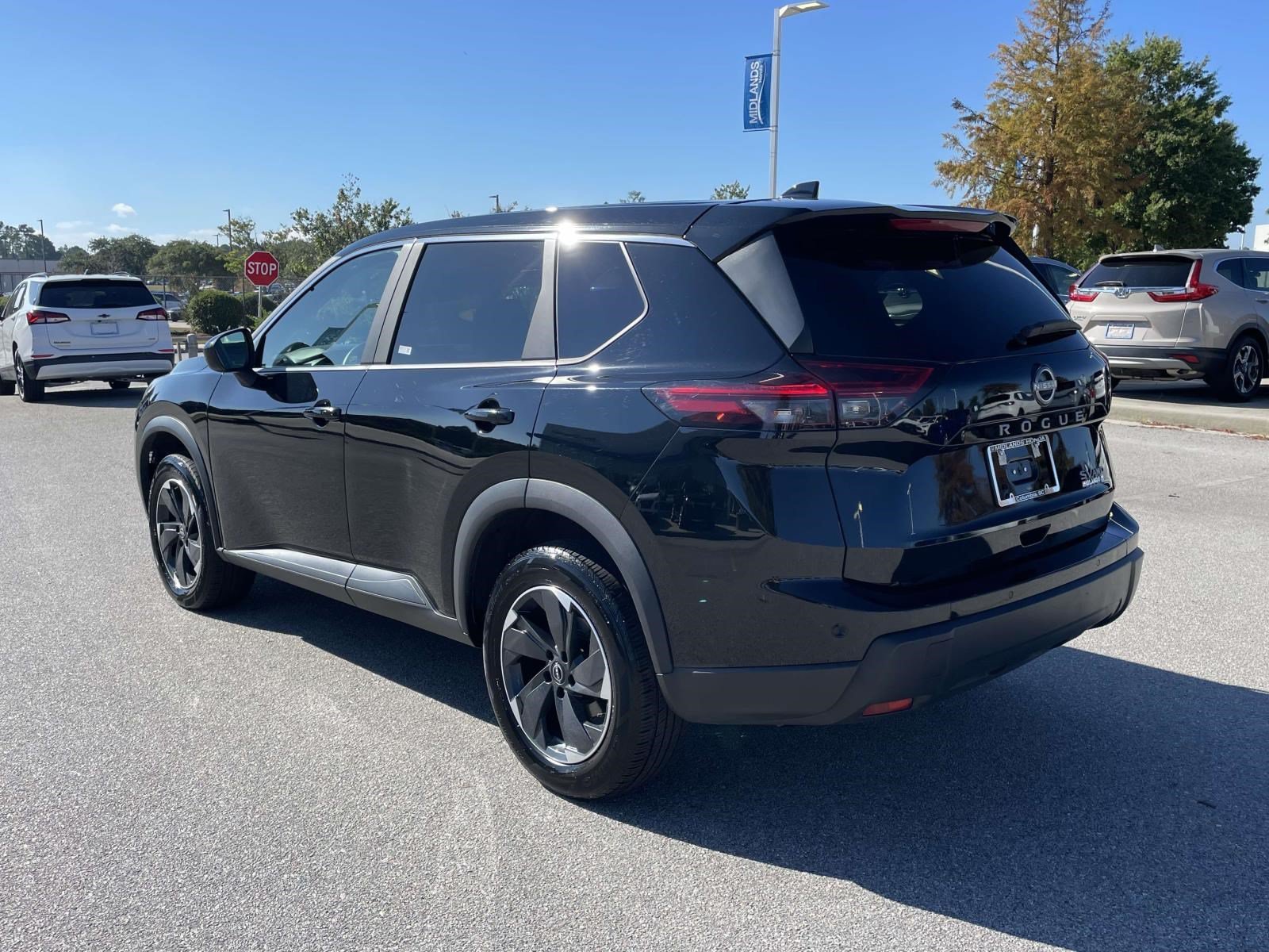 Used 2024 Super Black Nissan SV image 4