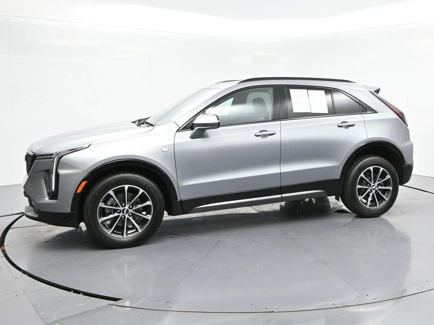 Used 2024 Argent Silver Metallic Cadillac Sport image 4