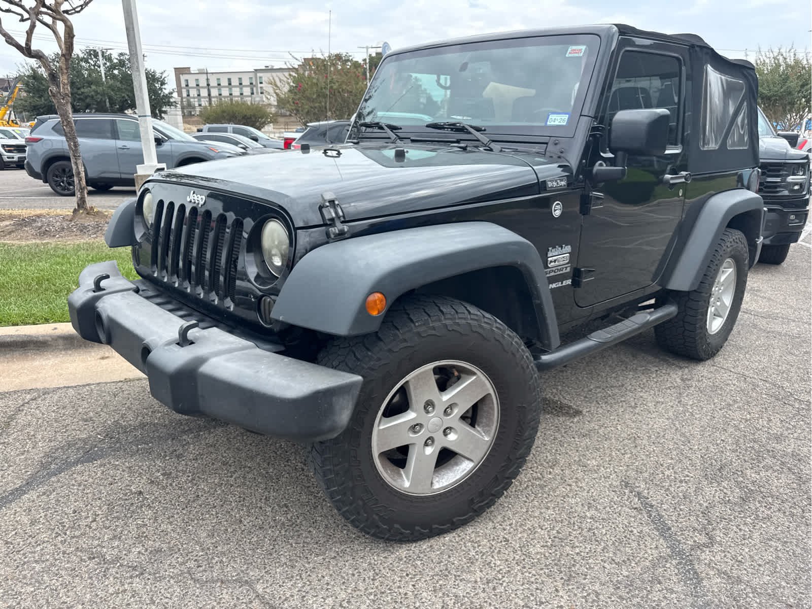 Used 2016 Black Clearcoat Jeep Sport image 2