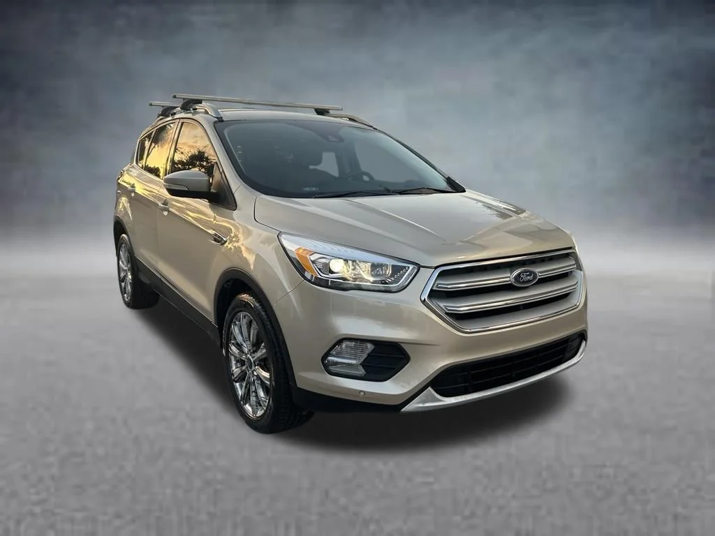 Used 2017 Ford Escape Titanium with VIN 1FMCU0J90HUE33686 for sale in Lake Worth Beach, FL
