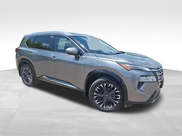 Used 2024 Gray Nissan Platinum image 1