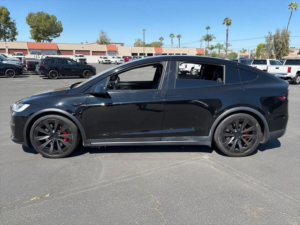 Used 2023 Solid Black Tesla Plaid image 5