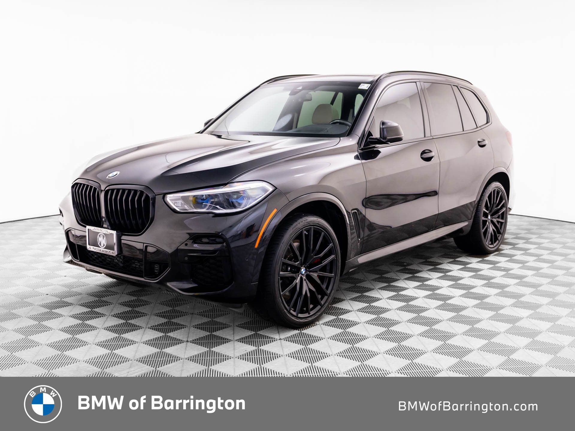 Used 2022 Black Sapphire Metallic BMW M50i image 1
