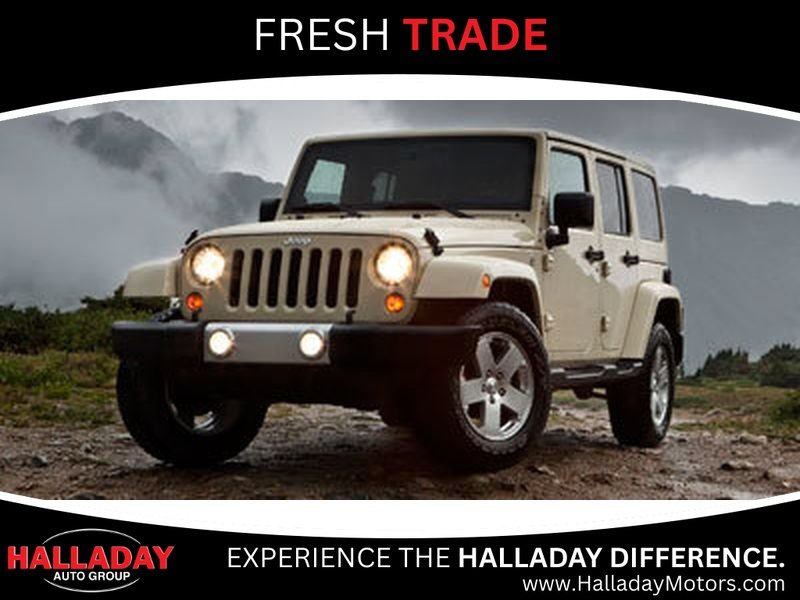 Used 2011 Mango Tango Pearlcoat Jeep Sport image 1