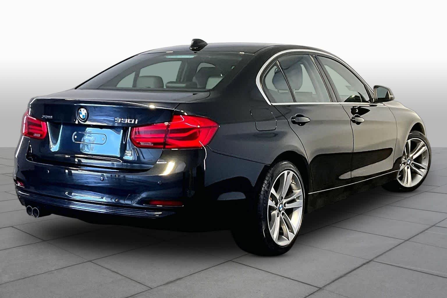 Used 2018 Black Sapphire Metallic BMW 330i xDrive image 13