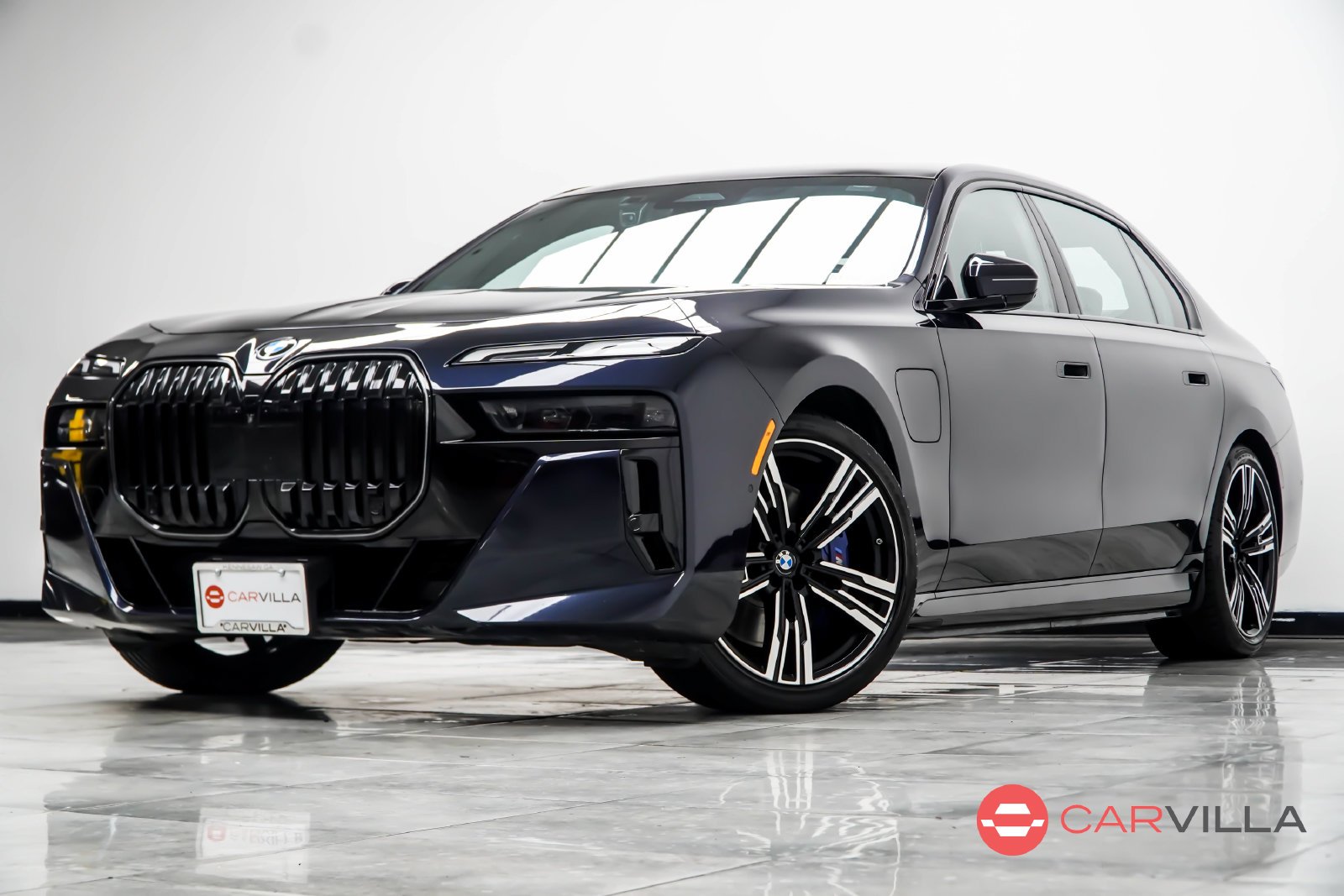 Used 2024 Black BMW 750e xDrive image 1
