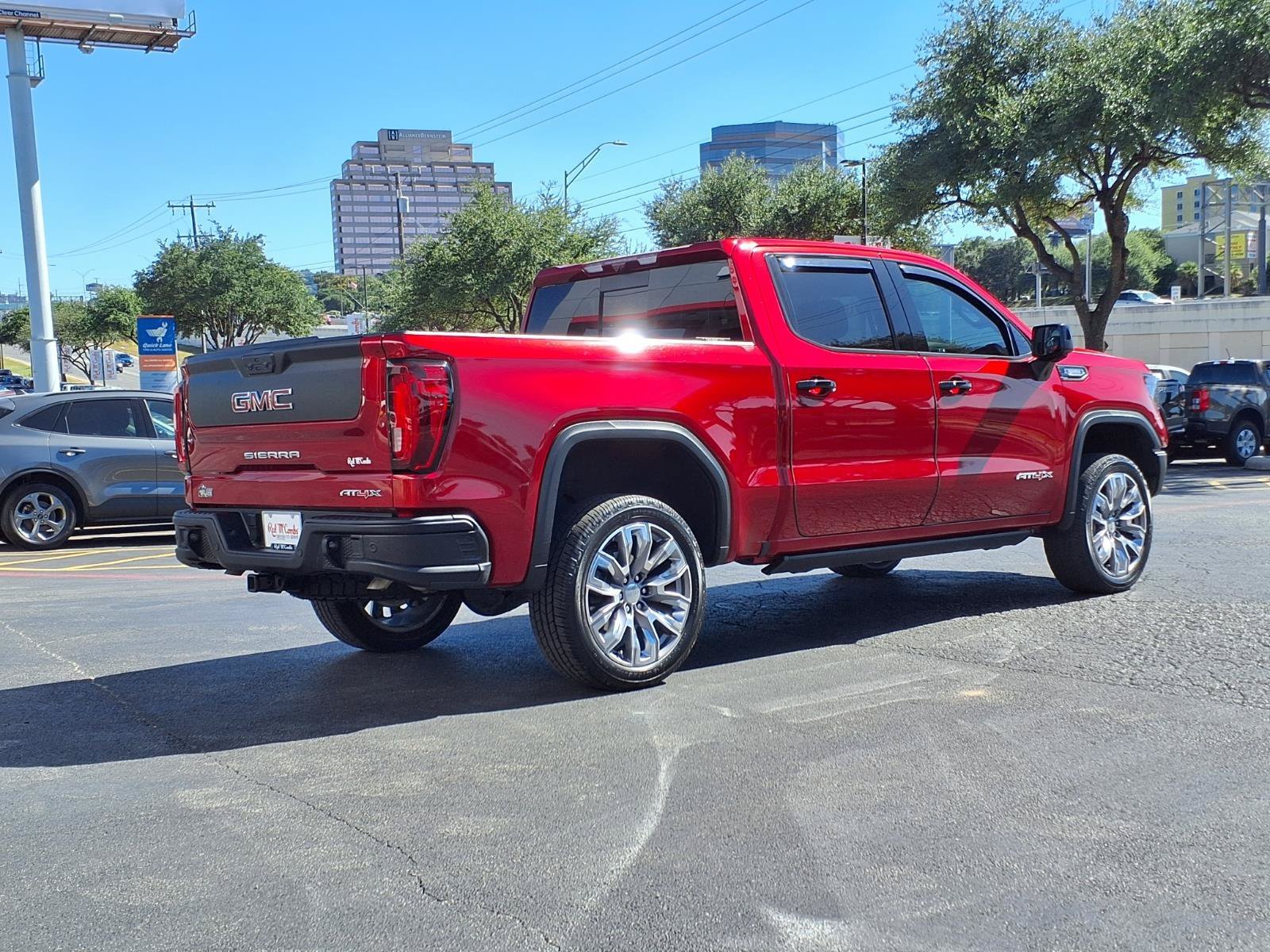 Used 2024 Volcanic Red Tintcoat GMC AT4X image 5