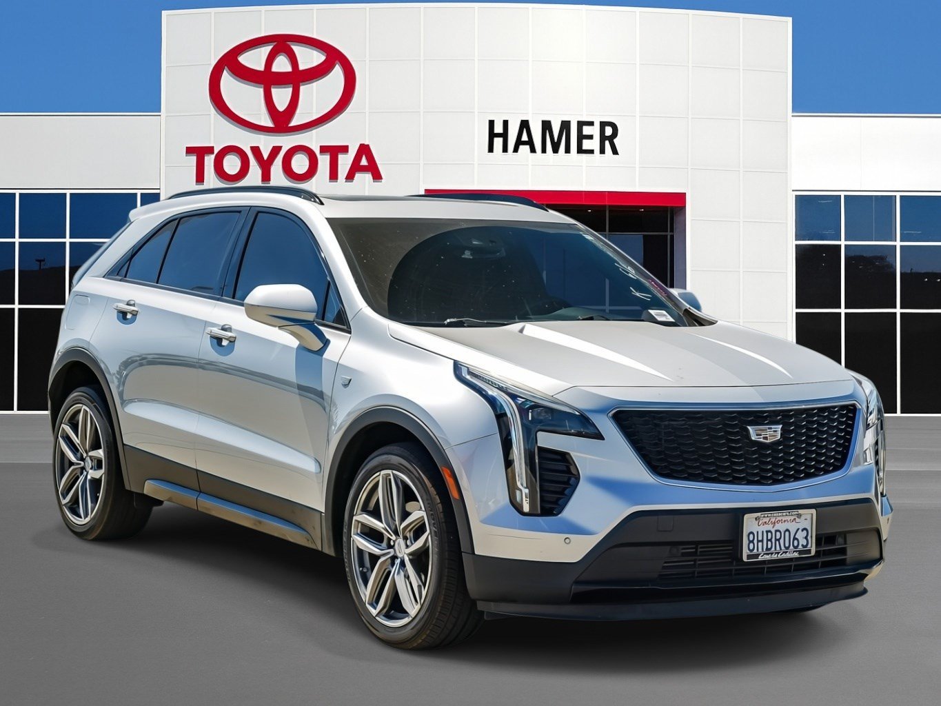 Used 2019 Radiant Silver Metallic Cadillac FWD Sport image 1