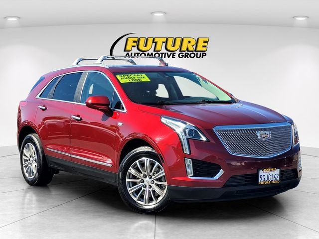 Used 2018 Red Cadillac Luxury image 1