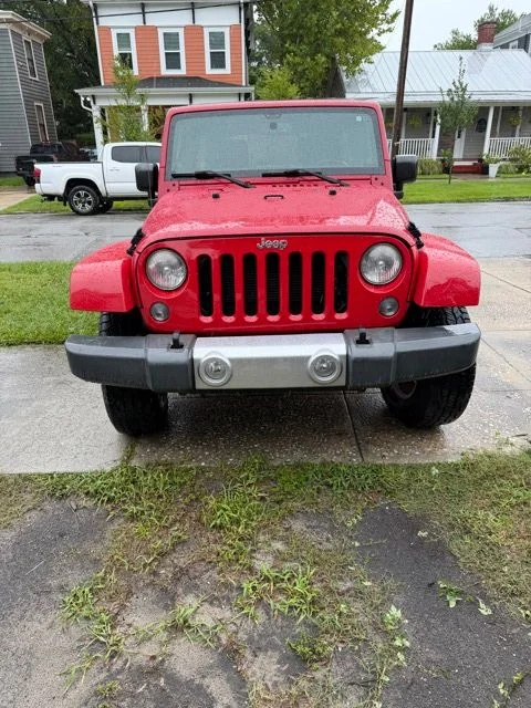 Used 2014 Red Jeep Unlimited Sahara image 31