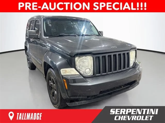 Used 2010 Gray Jeep Sport image 1