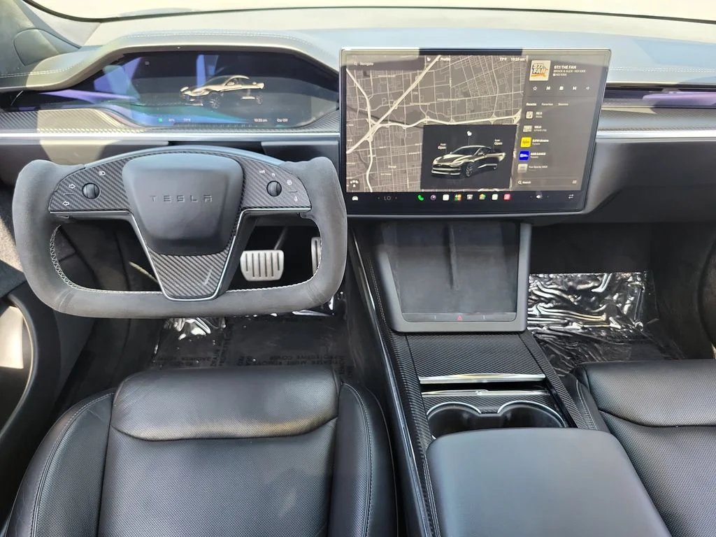 Used 2021 Solid Black Tesla Plaid image 4