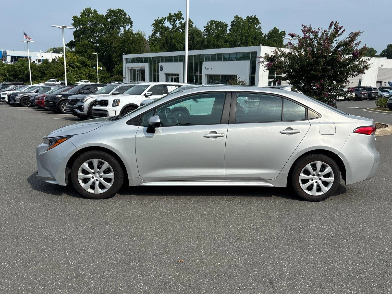 Used 2024 Classic Silver Metallic Toyota LE image 2
