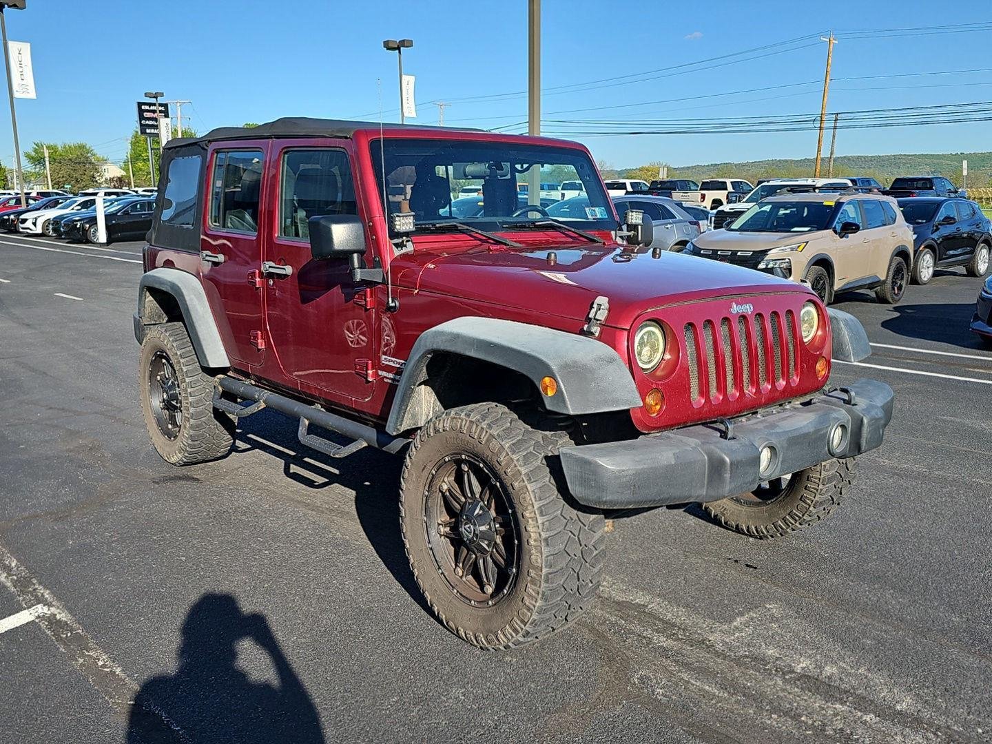 Used 2011 Deep Cherry Red Crystal Pearl Coat Jeep Sport image 3