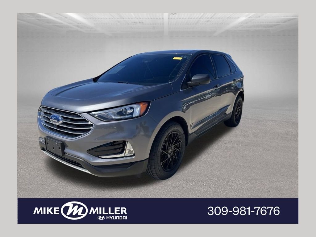 Used 2024 Gray Metallic Ford SEL image 1