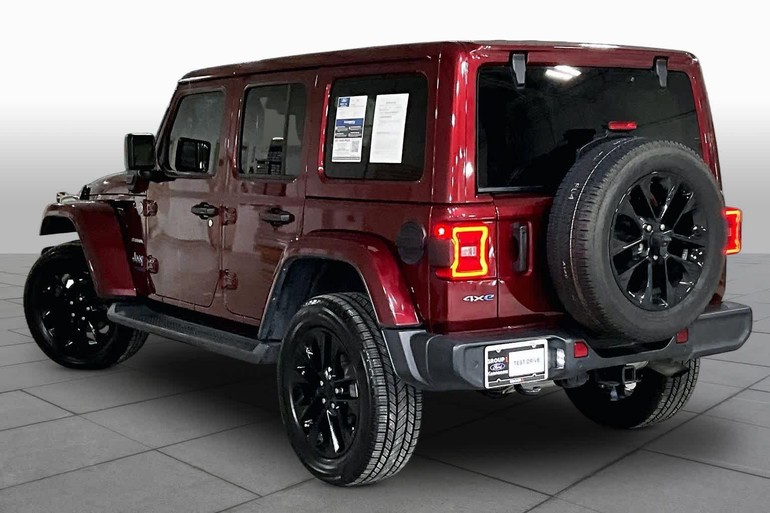 Used 2021 Snazzberry Pearlcoat Jeep Unlimited Sahara image 12