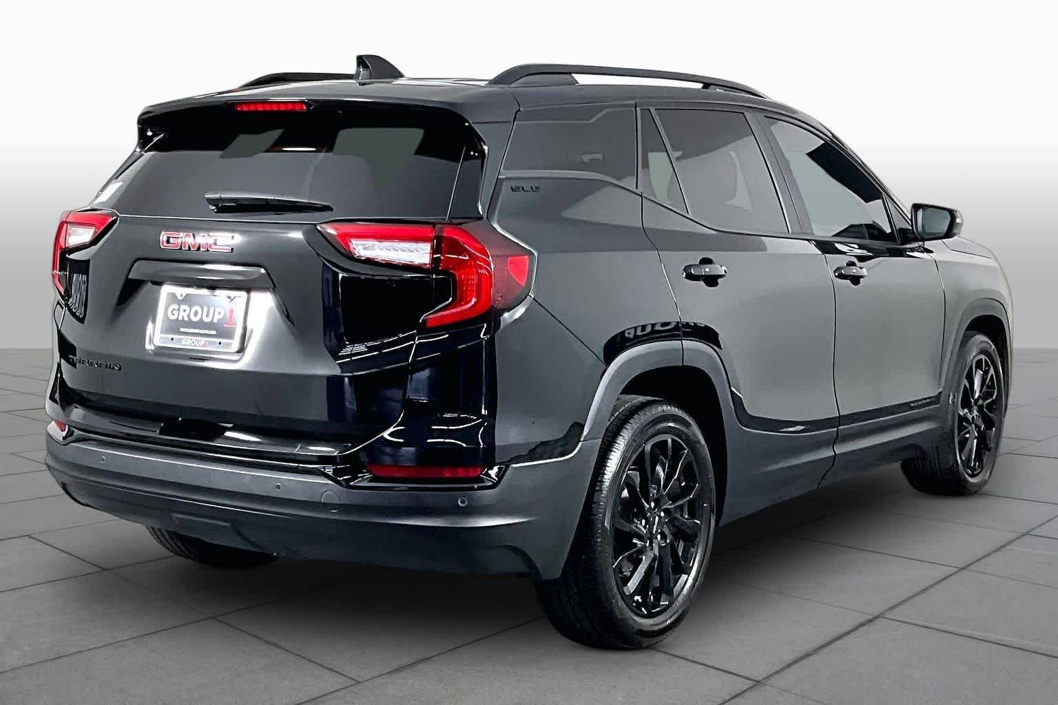 Used 2024 Ebony Twilight Metallic GMC SLE image 12