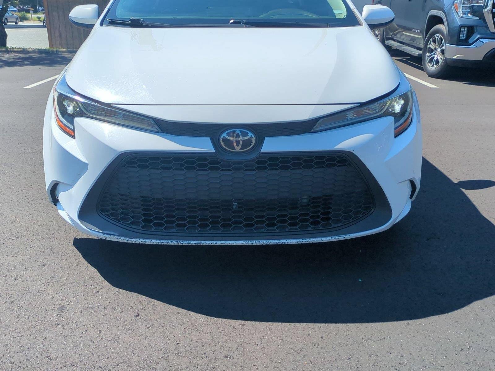 Used 2021 Super White Toyota LE image 14