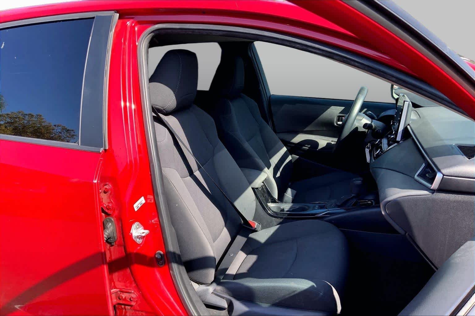 Used 2021 Barcelona Red Metallic Toyota LE image 8