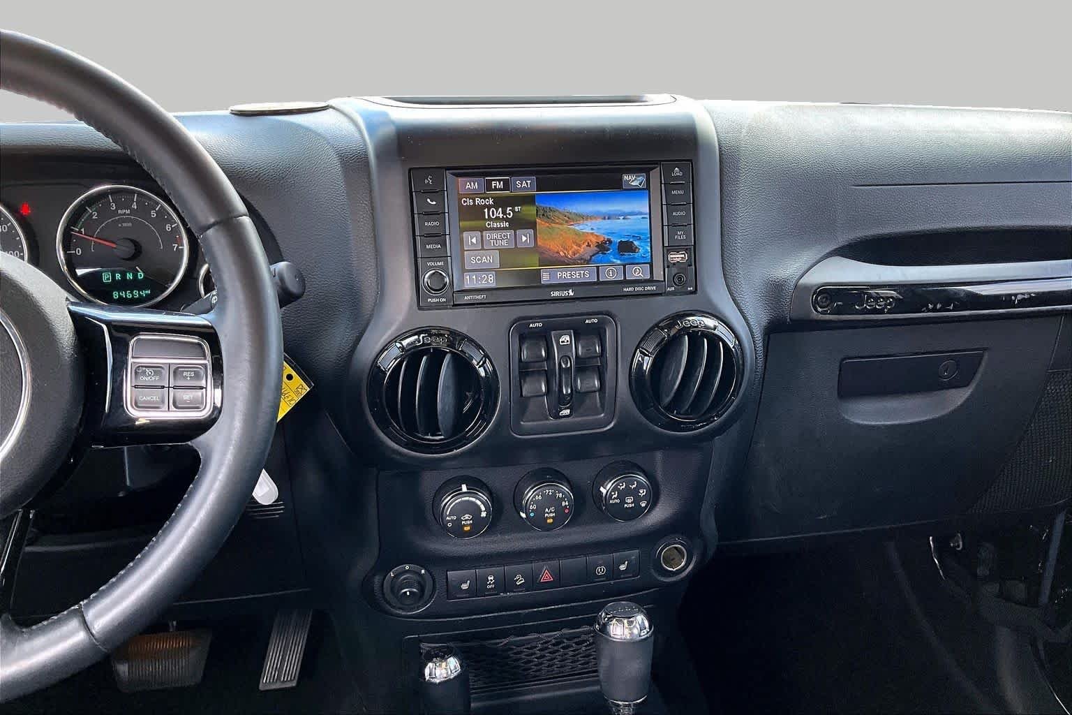 Used 2015 Black Clearcoat Jeep Altitude image 6