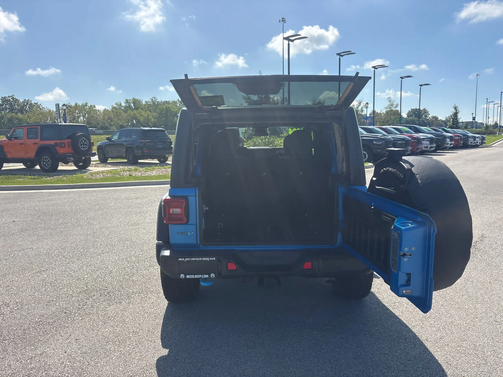Used 2024 Hydro Blue Pearlcoat Jeep Willys image 12