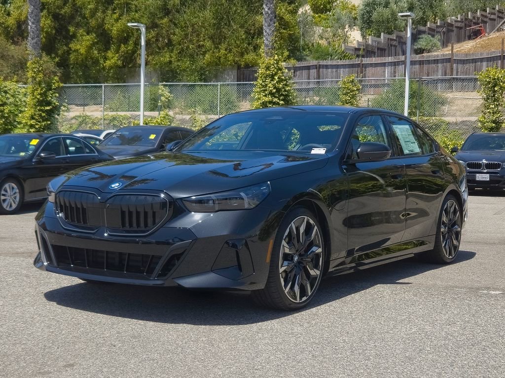 New 2026 Black Sapphire Metallic BMW 550e xDrive image 2