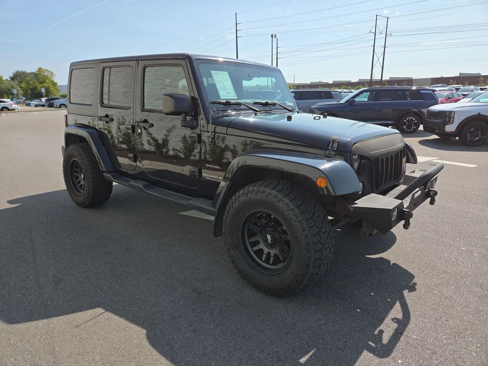 Used 2016 Black Clearcoat Jeep Unlimited Sahara image 8